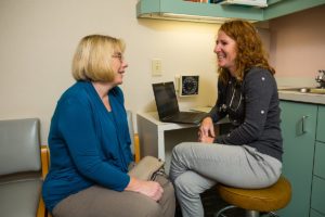 Doctor and patient talking